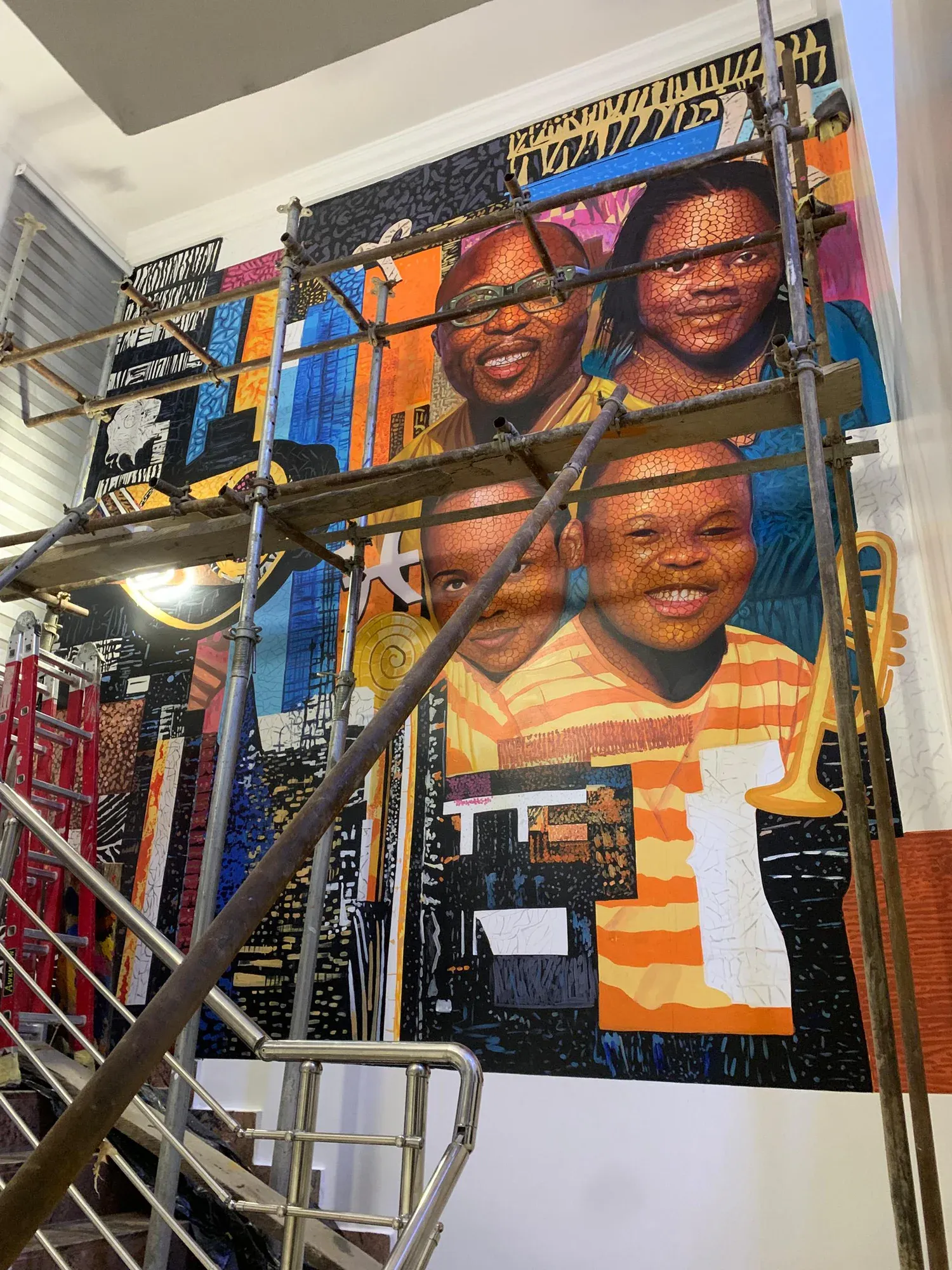 Full vertical view of the Ayẹyẹ mural at Egghead
