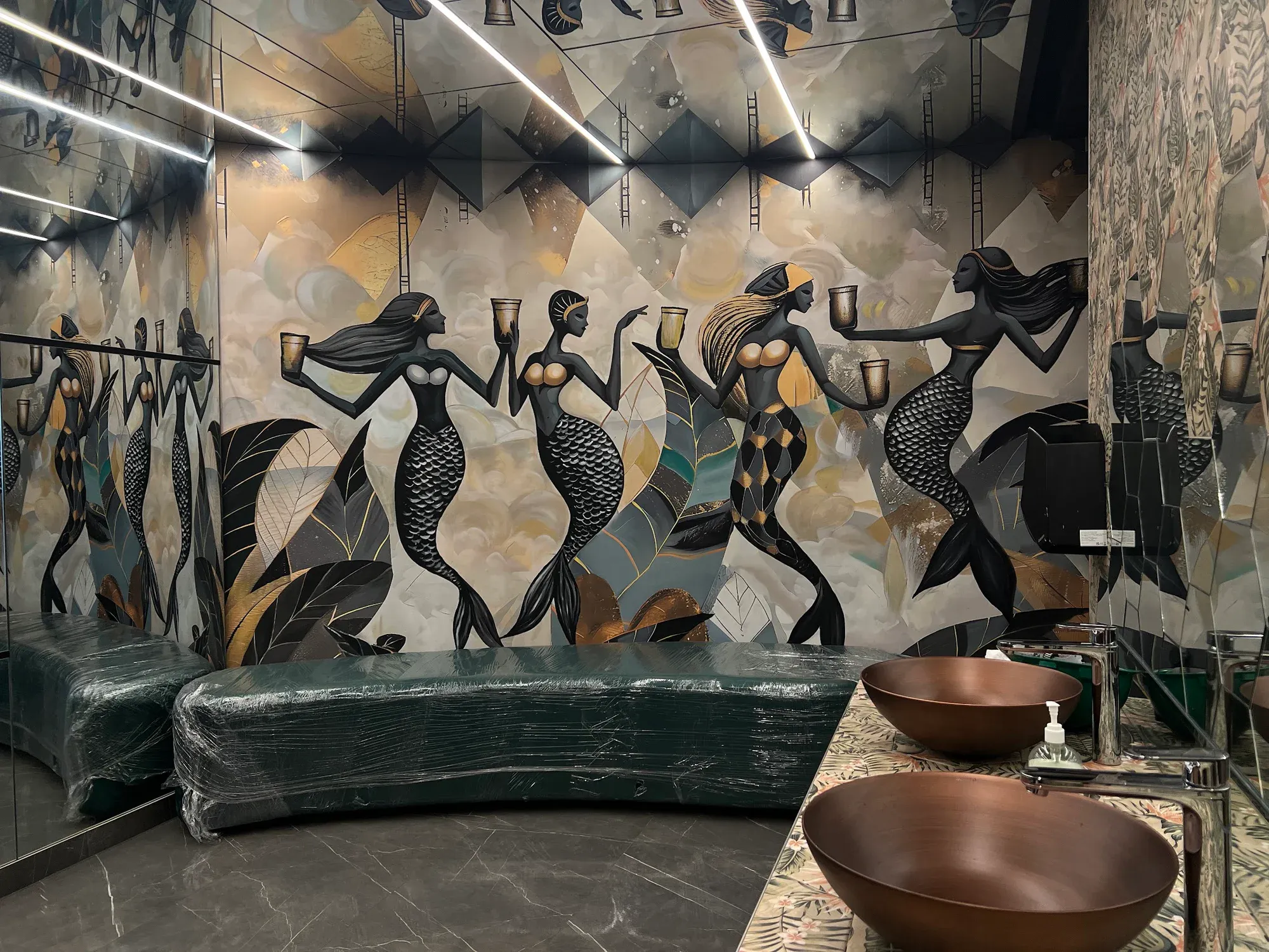 Large figurative mural extending across the CIEL lounge