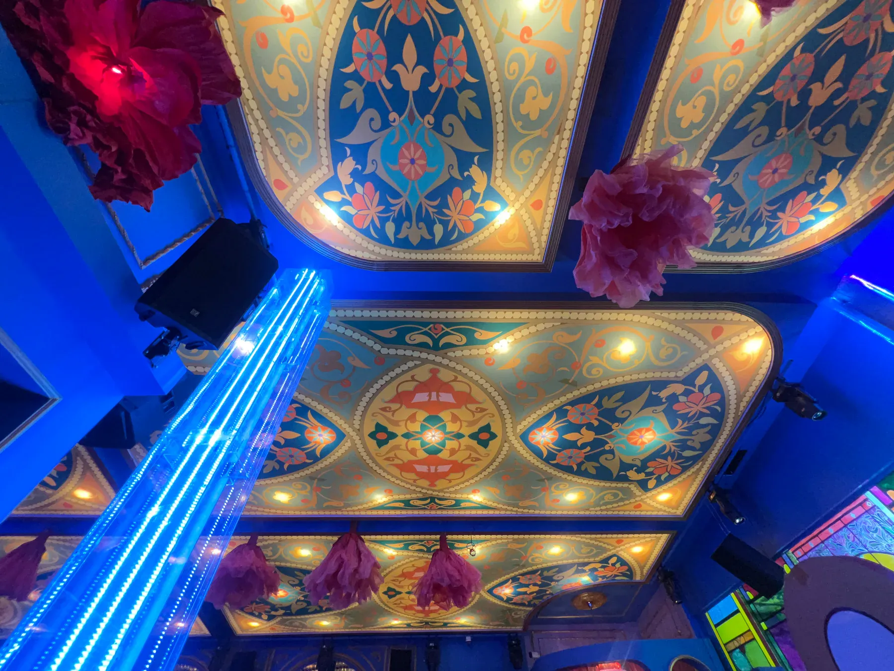 Club Boho's illuminated floral ceiling viewed across the main nightlife space