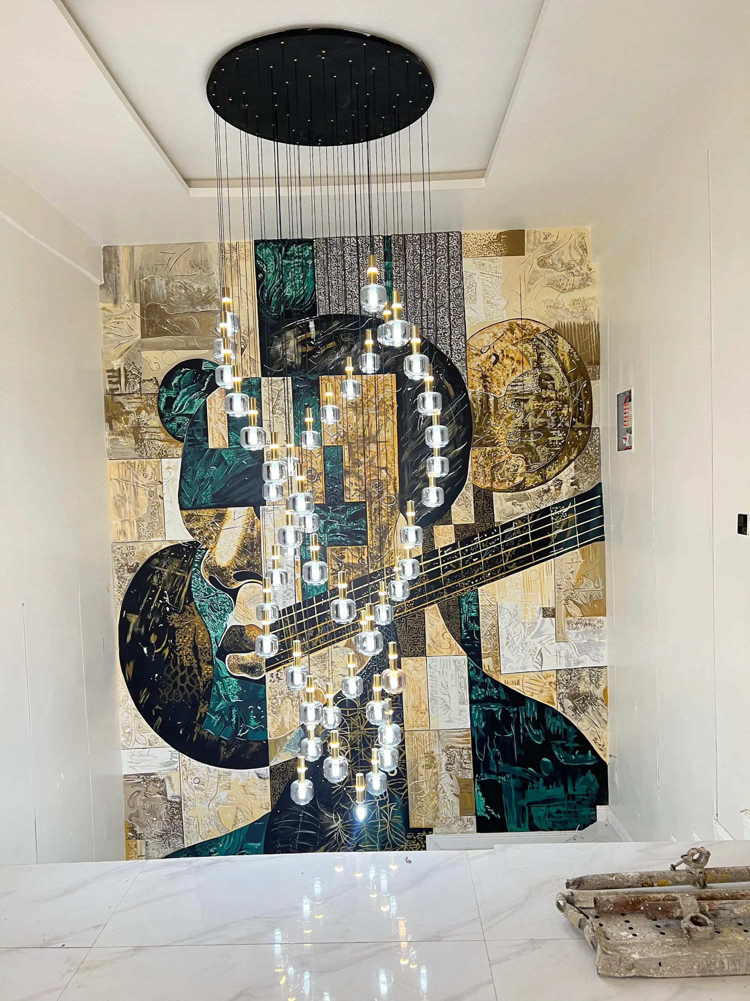 Giran mural installed through the stairwell of a private residence