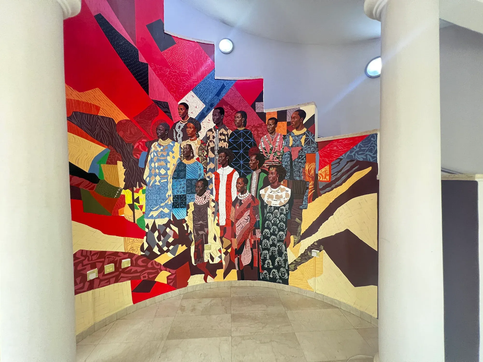 The Wheatbaker courtyard with its large figurative artwork integrated into the facade