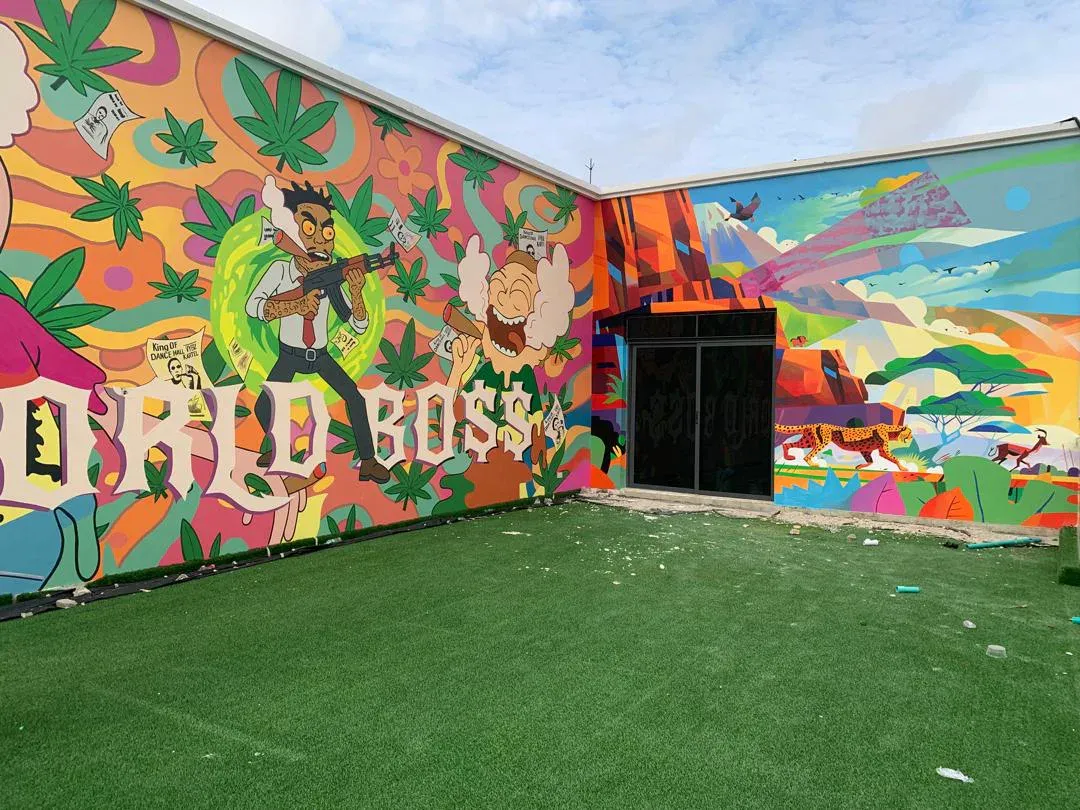 Left section of the World Bo$$ courtyard mural